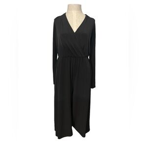 New BCBGeneration long sleeve black jumpsuit size small.NWT